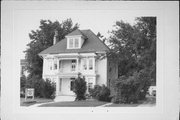 310 E WISCONSIN AVE, a Colonial Revival/Georgian Revival house, built in Oconomowoc, Wisconsin in 1910.