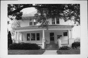 210 W WISCONSIN AVE, a Colonial Revival/Georgian Revival house, built in Oconomowoc, Wisconsin in 1915.
