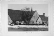 818 W WISCONSIN AVE, a Late Gothic Revival house of worship, built in Oconomowoc, Wisconsin in 1951.