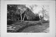 7TH, JUST BEFORE PERSHING, NEXT TO POST 693, a Contemporary house, built in Clintonville, Wisconsin in 1985.