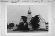 W SPRING ST AT SE CORNER WITH SMITH ST, a Queen Anne church, built in New London, Wisconsin in 1895.