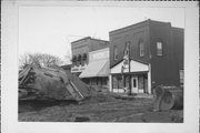 204 N MAIN ST, a Commercial Vernacular small retail building, built in Waupaca, Wisconsin in 1901.