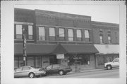 112-114 S MAIN ST, a Commercial Vernacular small retail building, built in Waupaca, Wisconsin in 1900.
