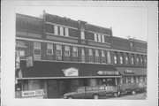212 S MAIN ST, a Queen Anne small retail building, built in Waupaca, Wisconsin in 1893.