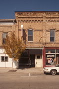 117 W MAIN ST, a Italianate small retail building, built in Omro, Wisconsin in 1912.