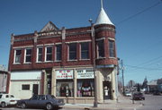 1124-1128 OREGON ST, a Queen Anne retail building, built in Oshkosh, Wisconsin in 1894.