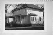 705 3RD ST, a American Foursquare house, built in Menasha, Wisconsin in 1905.