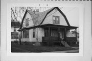 316 CHUTE ST, a Dutch Colonial Revival house, built in Menasha, Wisconsin in 1913.