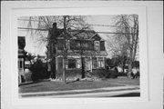 224 E FOREST AVE, a Dutch Colonial Revival house, built in Neenah, Wisconsin in 1914.