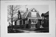215 W FOREST AVE, a Dutch Colonial Revival house, built in Neenah, Wisconsin in 1906.