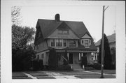 409 E WISCONSIN AVE, a Shingle Style house, built in Neenah, Wisconsin in 1892.