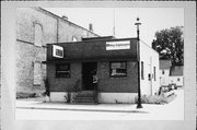 154-156 E MAIN ST, a Commercial Vernacular small office building, built in Omro, Wisconsin in 1950.
