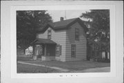 NW CORNER OF MICHIGAN ST AND RAILROAD TRACKS, a Side Gabled house, built in Omro, Wisconsin in .