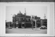 579-581 N MAIN ST, a Queen Anne large retail building, built in Oshkosh, Wisconsin in 1895.