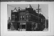 579-581 N MAIN ST, a Queen Anne large retail building, built in Oshkosh, Wisconsin in 1895.