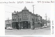 579-581 N MAIN ST, a Queen Anne retail building, built in Oshkosh, Wisconsin in 1895.