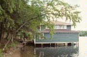 9161 KEMP RD, a Craftsman boat house, built in Woodruff, Wisconsin in 1924.