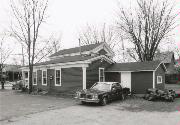 124 E MAIN ST, a Greek Revival house, built in Wautoma, Wisconsin in 1858.