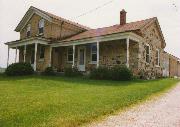 9323 HIGHLAND DR, a Greek Revival house, built in Kewaskum, Wisconsin in 1868.