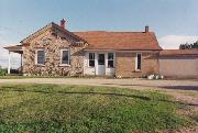 9323 HIGHLAND DR, a Greek Revival house, built in Kewaskum, Wisconsin in 1868.