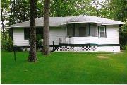 9264 HOWARD'S POINT RD (LAKE MINOCQUA), a Craftsman boat house, built in Minocqua, Wisconsin in 1947.
