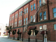 227-229 N WASHINGTON ST, a Commercial Vernacular large retail building, built in Green Bay, Wisconsin in 1887.