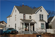 822 MAIN ST, a Queen Anne house, built in Eau Claire, Wisconsin in 1897.