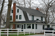 7213 HORSESHOE BAY RD, a Dutch Colonial Revival house, built in Egg Harbor, Wisconsin in 1919.