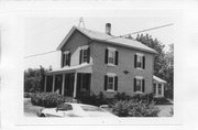 SW CNR OF WATER AND ADAMS STS, a Greek Revival house, built in Rockdale, Wisconsin in .