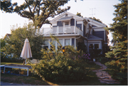 715-715A W 4TH AVE, a Greek Revival house, built in Oshkosh, Wisconsin in 1857.