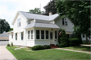 323 BRANCH ST / STATE HIGHWAY 83, a Gabled Ell, built in Hartford, Wisconsin in 1900.