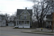 1603 Spring Pl., a Cross Gabled house, built in Racine, Wisconsin in 1909.
