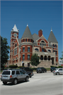 COURTHOUSE SQUARE, a Romanesque Revival courthouse, built in Monroe, Wisconsin in 1891.