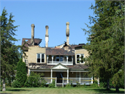 717 MARTIN ST, a Queen Anne house, built in Mauston, Wisconsin in 1875.