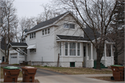 1725 MAIN ST, a Greek Revival house, built in Stevens Point, Wisconsin in 1873.