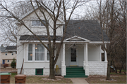 1725 MAIN ST, a Greek Revival house, built in Stevens Point, Wisconsin in 1873.
