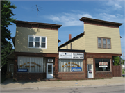 1239 MAIN ST, a Commercial Vernacular retail building, built in Marinette, Wisconsin in .