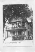 307-309 S BALDWIN ST, a Queen Anne duplex, built in Madison, Wisconsin in 1913.