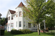 2129 WISCONSIN AVE, a Queen Anne house, built in New Holstein, Wisconsin in 1900.