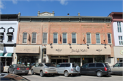115-117-119 3RD ST, a Italianate large retail building, built in Baraboo, Wisconsin in 1886.