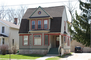 272 E 4TH ST, a Dutch Colonial Revival house, built in Fond du Lac, Wisconsin in 1900.