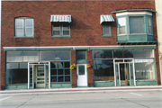 340-360 W GRAND AVE, a Commercial Vernacular retail building, built in Wisconsin Rapids, Wisconsin in 1915.