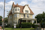 823-825 N EAST AVE & 107 ARCADIAN AVE, a Queen Anne house, built in Waukesha, Wisconsin in 1896.