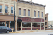 228-230 MAIN ST, a Commercial Vernacular retail building, built in Racine, Wisconsin in 1883.