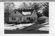 208 N PRAIRIE ST, a Gabled Ell house, built in Stoughton, Wisconsin in 1950.