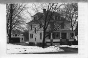 201 N PRAIRIE ST, a American Foursquare house, built in Stoughton, Wisconsin in 1914.