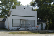 6421 W US HWY 14, a Boomtown small retail building, built in Janesville, Wisconsin in 1890.