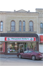 115-119 3RD AVE, a Italianate retail building, built in Baraboo, Wisconsin in 1872.