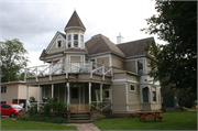 302 E WALNUT ST, a Queen Anne house, built in River Falls, Wisconsin in 1894.