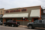 110 S MAIN ST, a Commercial Vernacular large retail building, built in River Falls, Wisconsin in 1890.